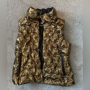 The North Face gold foil vest